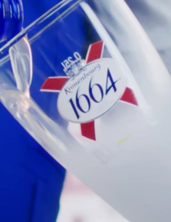 Pouring Bottle Kronenbourg 1664 Beer